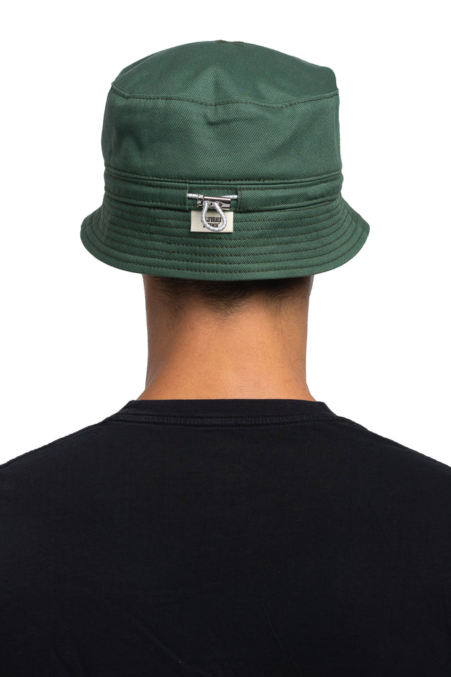 Back view of tapered bucket hat in evergreen colorway on model.