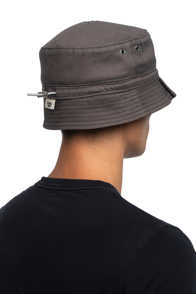 Three quarter back view of tapered bucket hat in graphite colorway on model.