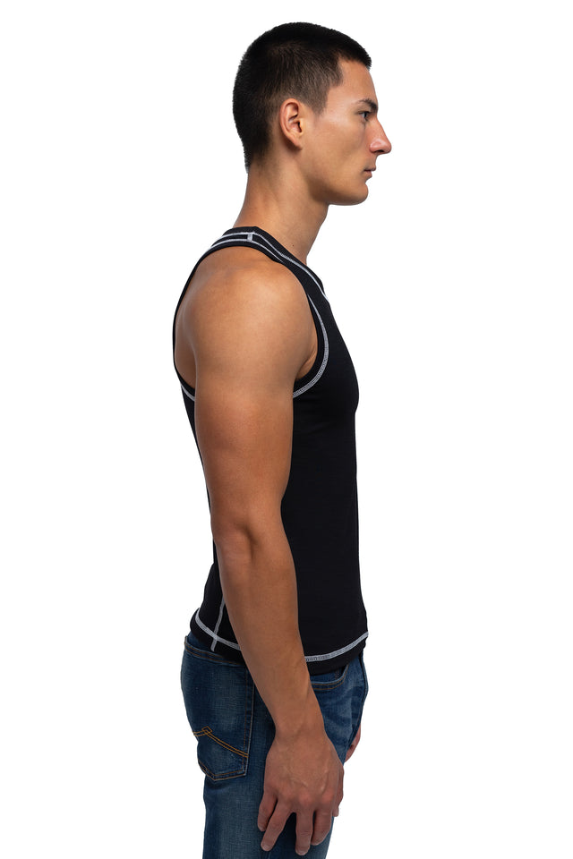 Side view of racer crew tank in black colorway on model.
