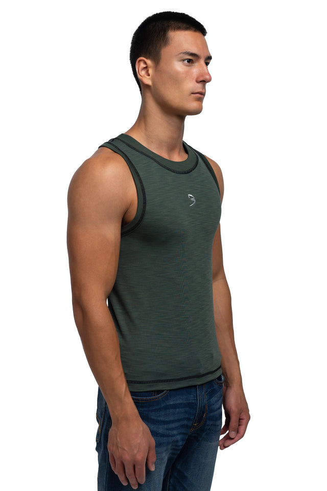 Three quarter front view of racer crew tank in evergreen colorway on model.