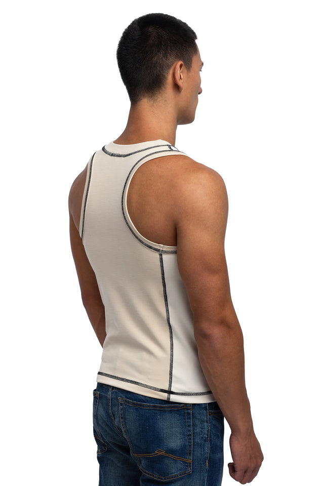 Three quarter back view of racer crew tank in ivory colorway on model.