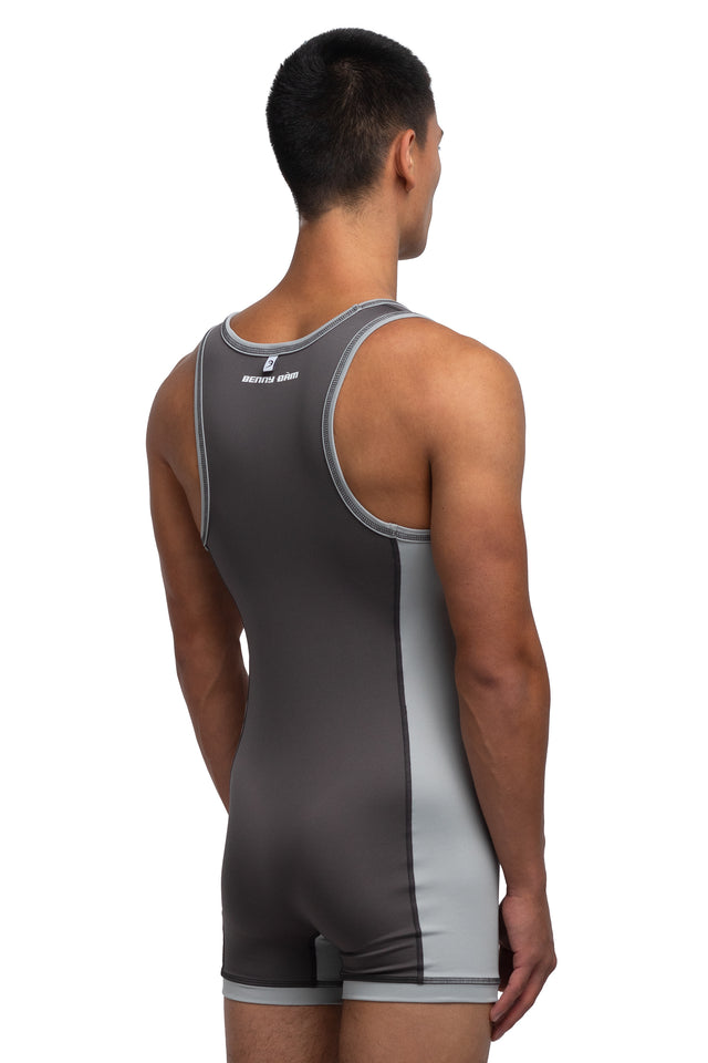 Three quarter back view of singlet in graphite/mist colorway on model.