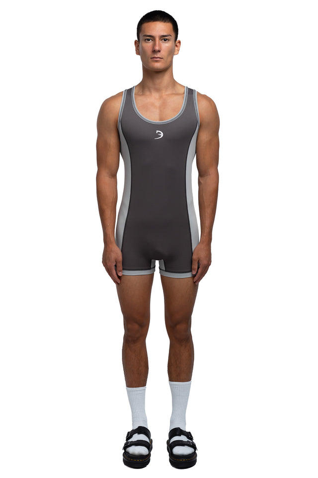 Full body front view of singlet in graphite/mist colorway on model.