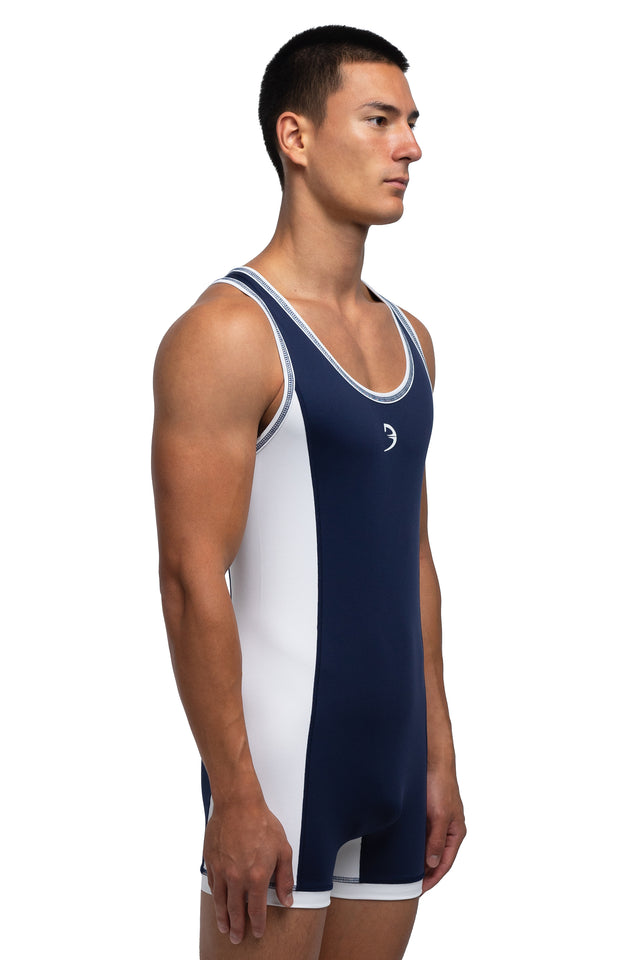 Three quarter front view of singlet in midnight blue/white colorway on model.