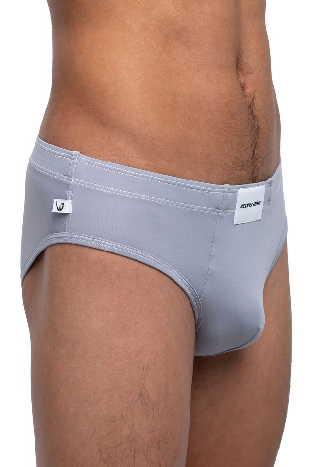 Three quarter front view of classic briefs underwear on model in slate colorway. (Close up)