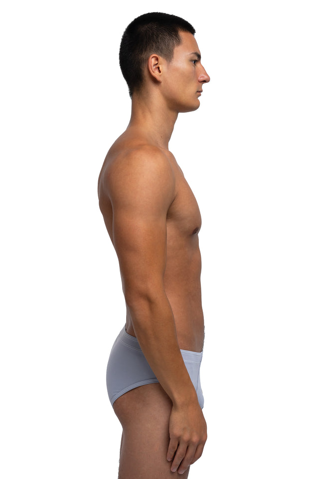 Side view of classic briefs underwear on model in slate colorway.