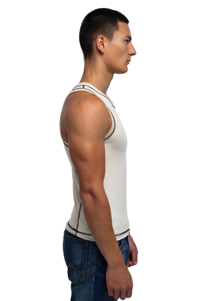 Side view of racer crew tank in ivory colorway on model.
