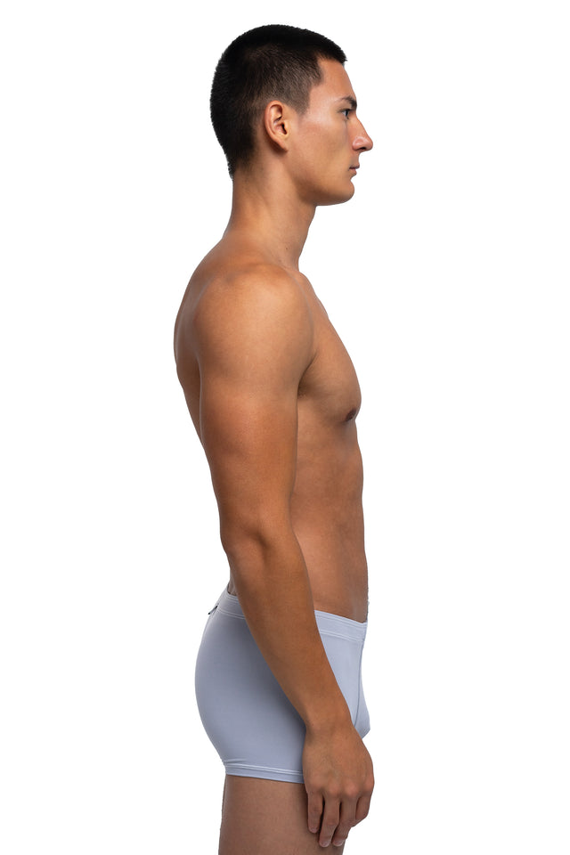 Side view of boxer briefs underwear on model in slate colorway.  